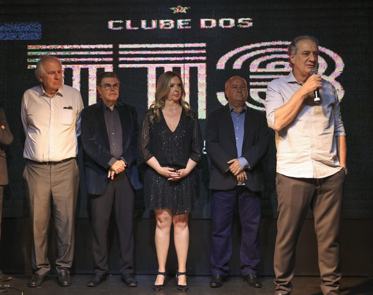 Presidentes Sérgio Coelho, do CAM, e Maria Alice, do IG, em noite de confraternização